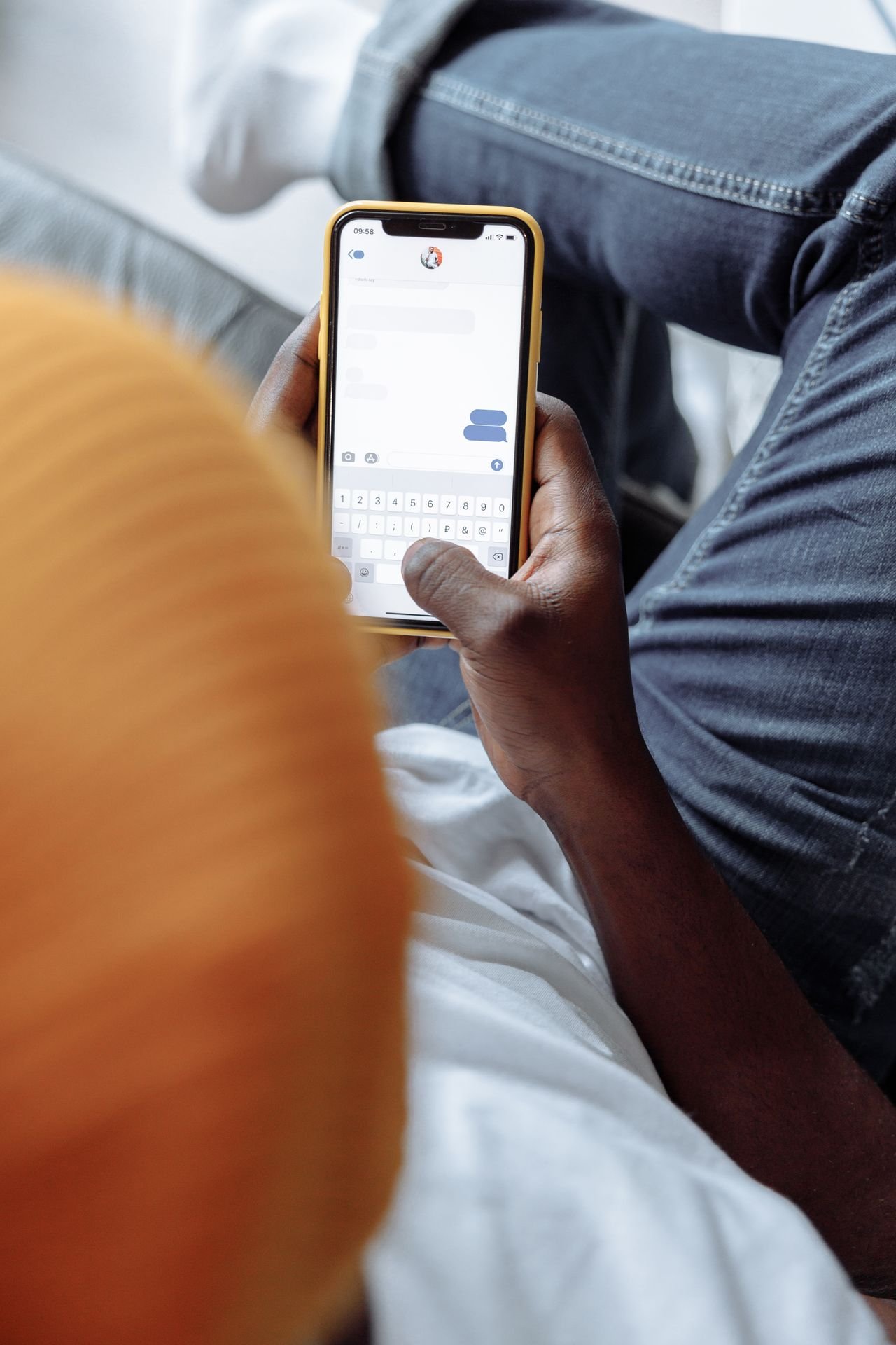 Person texting on a mobile phone