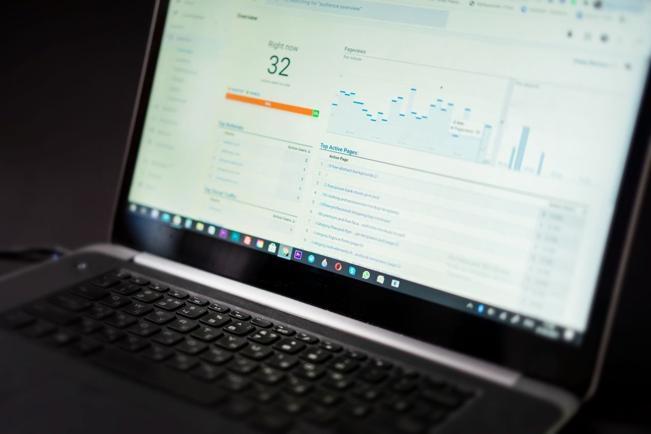 Laptop on a desk used for practice reporting