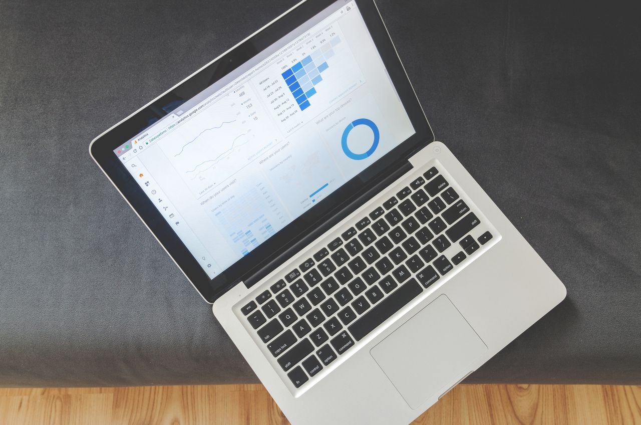 Laptop on a desk used to review a dental practice website design