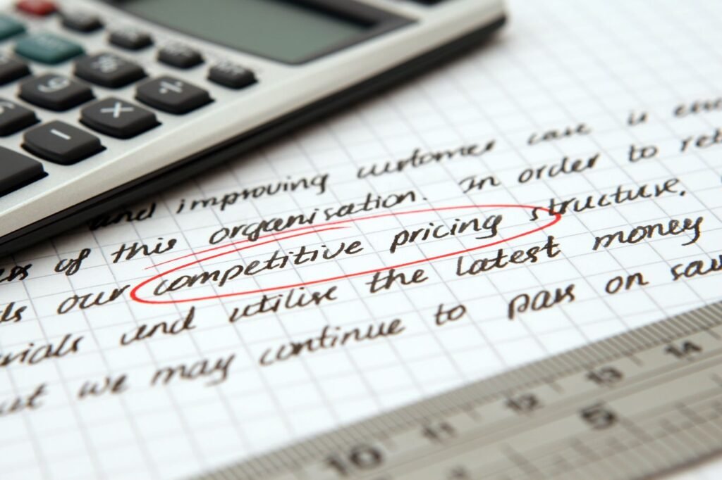 Handwritten budget and cash flow notes for a dental practice